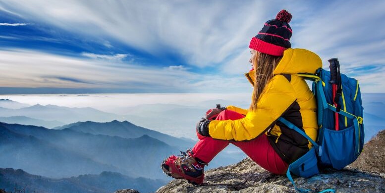 young-woman-sitting-hill-high-mountains-1-